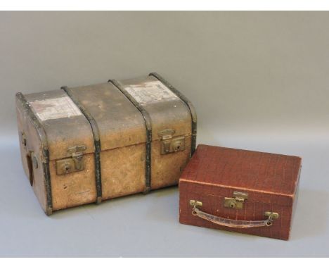 A leather cased ladies vanity set, and a small cabin trunk