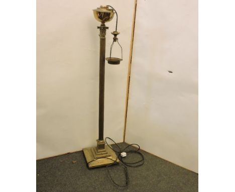 A late Victorian brass telescopic oil lamp, converted to electricity