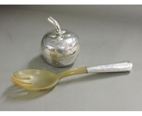 An Eastern silver pot and cover, and a horn and silver mounted fork