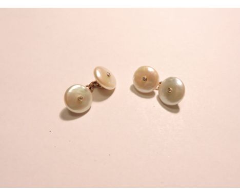 A pair of 18ct gold cultured freshwater coin pearl and diamond cufflinks