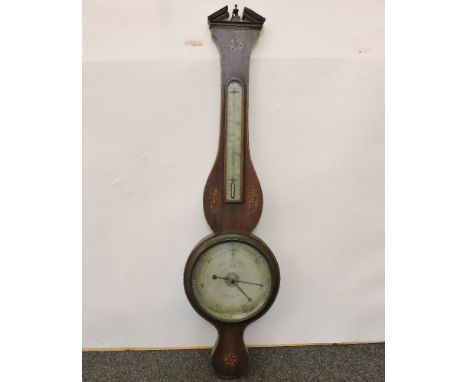An inlaid mahogany wheel barometer, the silvered dial inscribed, Cattley & Co, Holborn, London, No 81, 97cm high