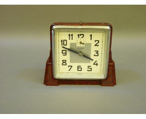 An Art Deco bakelite alarm clock, inscribed Bayard Bloc, 11.5cm, high