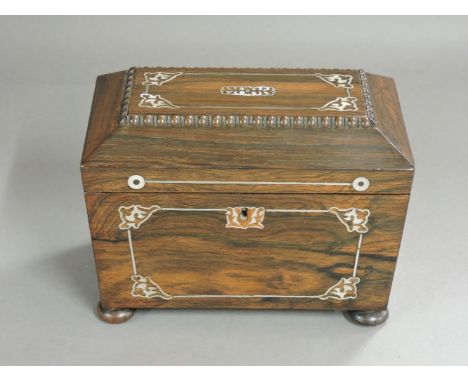 A Victorian rosewood and mother of pearl tea caddy, 20.5cm wide