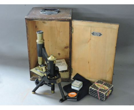A late 19th/early 20th century microscope, by J Swift & Son, London, cased