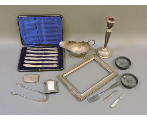 Silver items, including frame, candlestick, sauce boats, etc