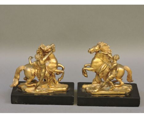 A pair of gilt bronze Marley horses and horsemen, 13cm high