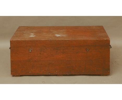 A stained wood seaman's chest, an early 20th century travel trunk, and a small stained pine tool box