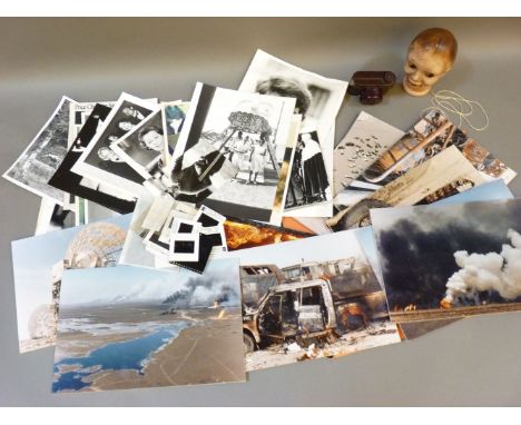 A folder of Royal photographs, including the Queen, Princess Diana, etc, ten Gulf War photographs, a bakelite camera, and a v