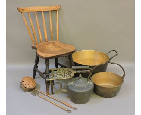 A 19th century child's chair, two brass preserve pans, trivet, toasting fork, chestnut roaster, and a copper kettle