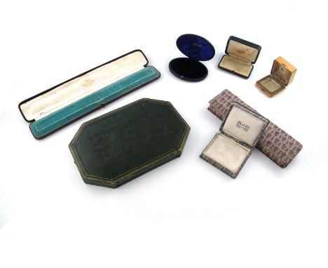 Seven assorted jewellery boxes, including an early 19th century green leather button box with elaborate blind-stamped decorat