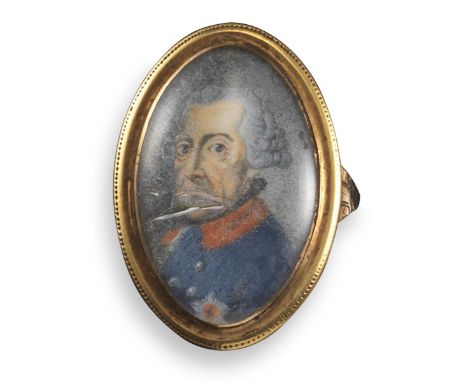 An 18th century portrait gold ring depicting Frederick the Great, in closed back yellow gold setting, size M 1/2 (glass crack