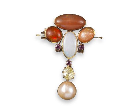 An Arts and Crafts gem-set gold brooch, set with a cluster of fire opal cabochons, a white opal and three rubies, suspending 