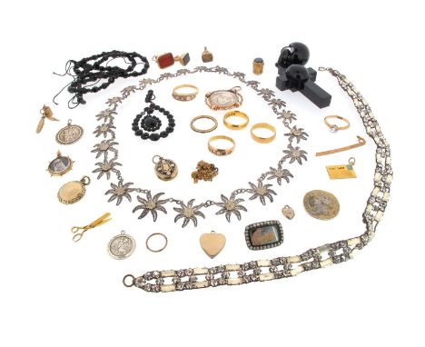 A mixed quantity of jewellery including a black enamel locket pendant, a gold horseshoe brooch, four seals, a watch key, a si