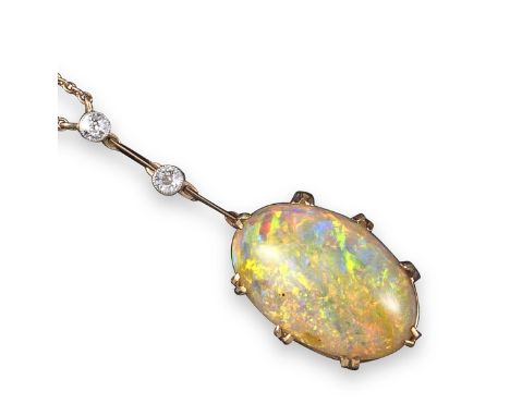 An opal and diamond pendant, the oval-shaped solid white opal suspends from two circular-cut diamonds in an articulated knife