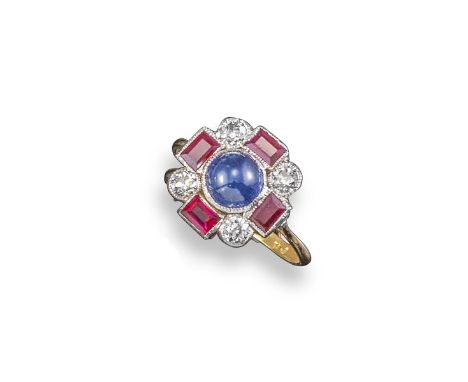 A sapphire, ruby and diamond cluster ring, set with a cabochon sapphire within border of baguette-shaped rubies and circular-