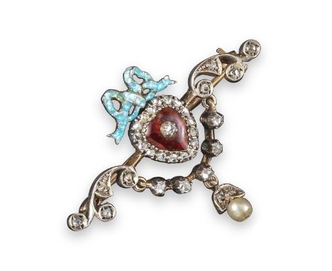 A late 19th century heart-shaped red enamel brooch, within diamond-set swags and beneath a blue enamel bow in silver and gold