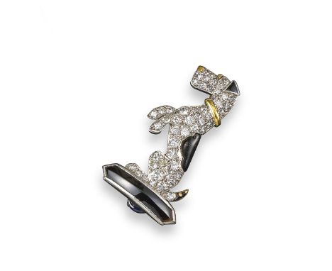 An Art Deco diamond and onyx dog brooch, the stylised Lakeland Terrier is pave-set with circular-cut diamonds, with black ena