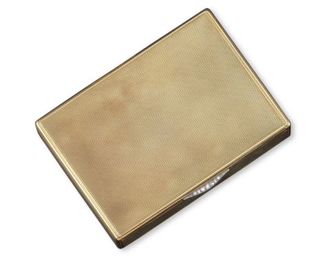 A gold box by Cartier, of rectangular form with engine-turned decoration and diamond-set thumbpiece. Marked J.C. and 9ct with