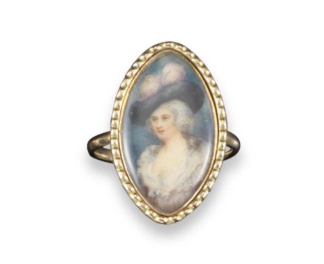 An 18th century gold portrait ring, depicting a lady within gold border, closed back with inscription for Mary Patey 1778, si