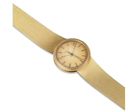 PATEK PHILIPPE - A gentleman's 18k Calatrava bracelet watch reference 3563.3, gold 'Clous de Paris' dial with black and gold 