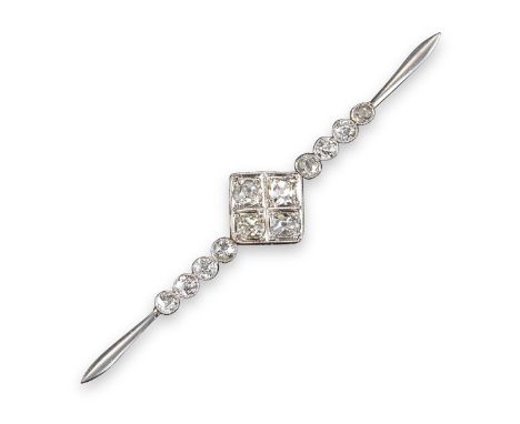 An Edwardian diamond-set bar brooch, centred with a quatrefoil of cushion-shaped diamonds and four smaller diamonds to each s