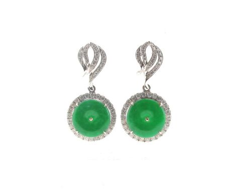 A pair of jade and diamond drop earrings, the circular jade discs set within a surround of small round brilliant-cut diamonds