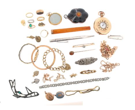 A mixed lot of jewellery, including a curb-link gold bracelet with heart-shaped padlock clasp, a curb-link gold charm bracele