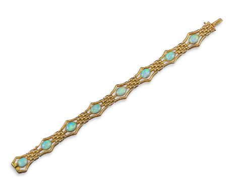 An opal set gold bracelet, the fancy yellow gold links are set with oval opal cabochons, 17cm long