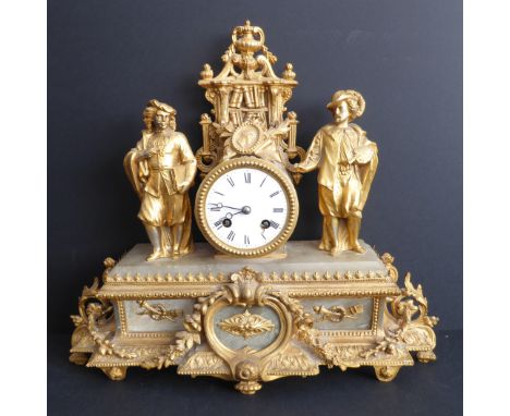 A 19th century French gilt-metal and onyx figural eight-day mantle clock: the two figures allegorical of the arts and literat