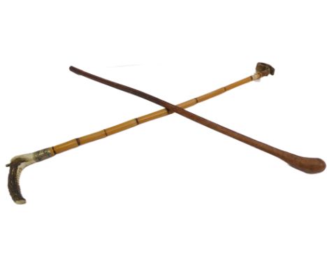 A leather-bound whalebone-type riding crop (80 cm) and a&nbsp;bamboo hunting crop with antler hook and white-metal collar eng