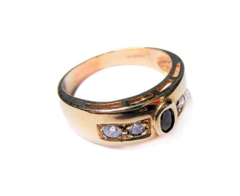 A 9-carat gold ring set with a sapphire and diamonds, ring size O