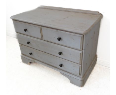 A good modern limed-pine bedroom chest: two half-width over two full-width drawers, raised on shaped bracket feet with recess