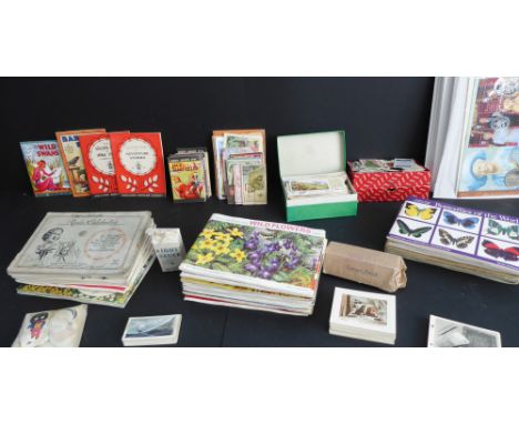 A varied collection of cards, commemorative First Day Cover and Crown sets, booklets and miniature books:27 albums (22 Brooke