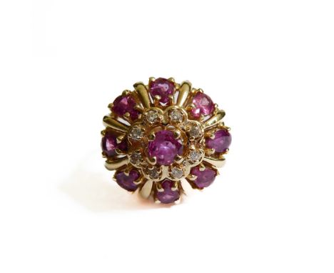 A 14-carat gold, ruby and diamond cluster dome-top ring,&nbsp;ring size Q/R