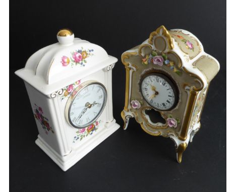 A hand-gilded and decorated Dresden porcelain-cased mantle clock (21.5cm high), together with a later example (2)