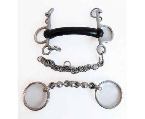 A 6" loose ring Waterford bit and a 6" Pelham bit