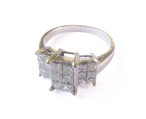 An 18-carat white gold ring set with 18 princess-cut white diamonds,&nbsp;ring size M
