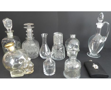 Assorted glassware comprising:two decanters, one with mushroom stopper (25 cm high), the other with etched monogram (28 cm hi