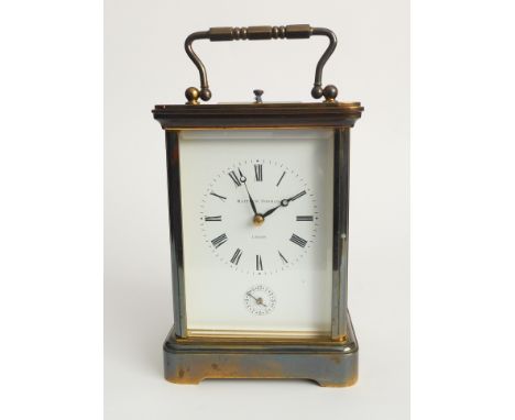 A fine quality gilt-metal carriage clock: the gilded repeating movement striking on a gong and signed 'Matthew Norman - Londo