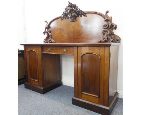 A large mid-19th century mahogany pedestal sideboard: single central drawer between the drawers stamped 'Harris, Carmarthen' 