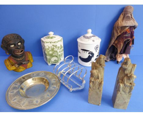 An assortment comprising:an early 20th century four-division silver-plated toast rack;an early 20th century silver-plated dis
