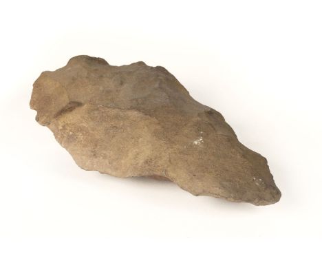 Palaeolithic Hand Axe. A large Palaeolithic hand axe from Oman, a fine and rare specimen which weighs 2kg and measures 24cm Q