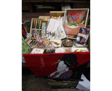 A collection of Japanese trinkets inc fans, gift boxes, print on a scroll, chop sticks, Tengu prints, coasters etc etc