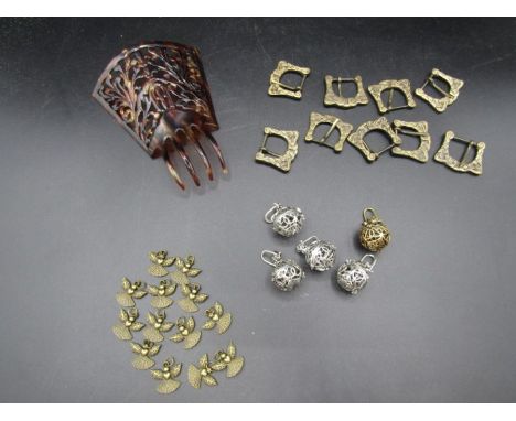 Angel pendants, pomander balls, tortoishell hair comb and belt buckles