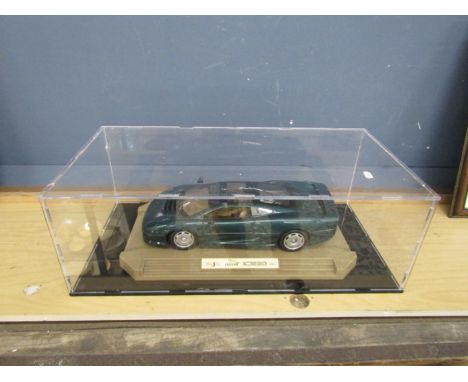 Maisto Jaguar XJ220 model in case. Case size 21cm x 31cm x 62cm approx&nbsp;