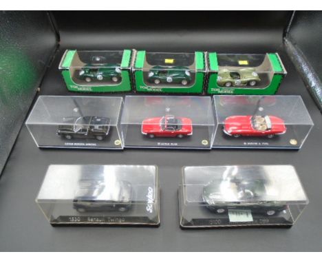 8 Cased/Boxed Diecast Model Cars to include: Kyosho (Lotus Elan, Lotus Europa Special and Jaguar E-Type), Solido (Aston Marti