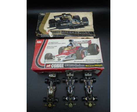 Collection of 5 Corgi Diecast Model Cars to include: JPS Lotus Formula 1 (boxed), TEXACO-Marlboro McLaren M23F1 (boxed), Team