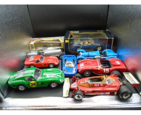 9 Assorted Burago Diecast Model Cars to include: Ferrari, Lotus and Bugatti (various scales including 1:18, 1:24 etc) (2 boxe