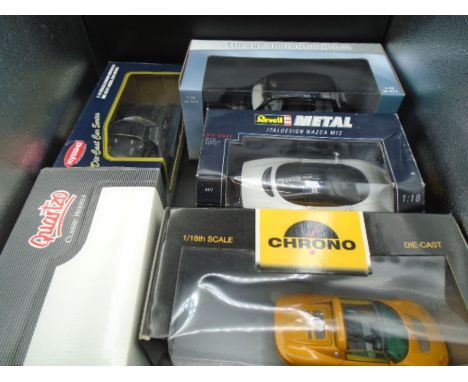 5 Boxed Diecast Model Cars to include: European Collectibles Sun Star 1998 TX1 London Taxi Cab, Quartzo Lotus 49B, Kyosho Lot