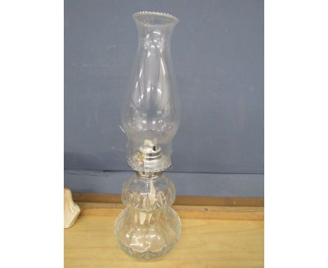 A glass oil lamp